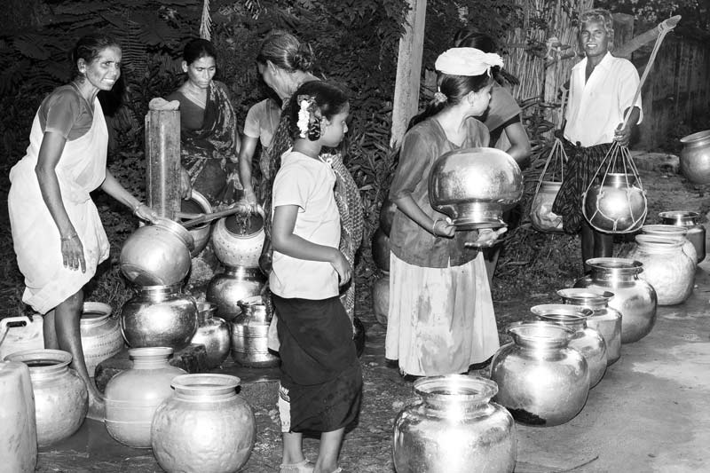 Queue and Rush for Drinking Water at a public standpoint in a village near Kolleru Lake in West Godavari district, Andhra Pradesh